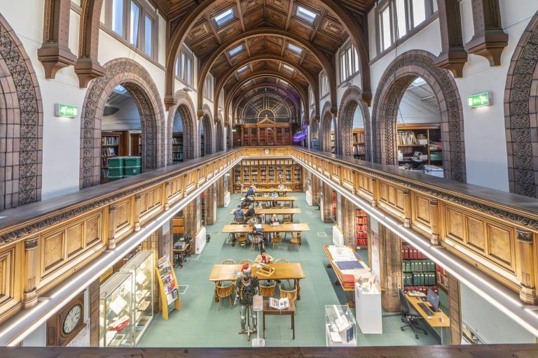 Internal image of the Local and Family History library from above, showing desks and books