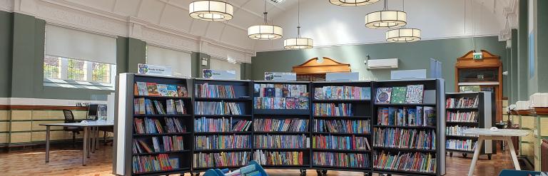 Internal image of Armley Library with shelves of books